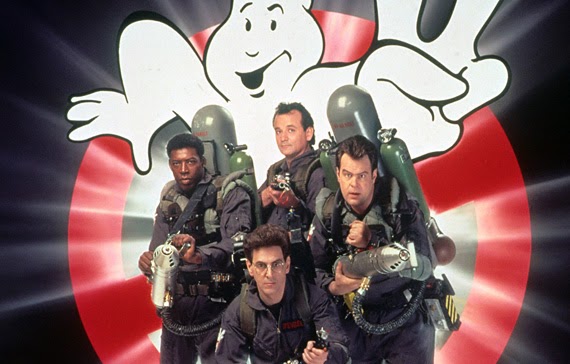 Ghostbusters team with logo in background